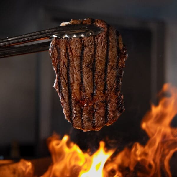 2 NFL min Mastering the Flame: How to Grill the Perfect Steak Over an Open Fire